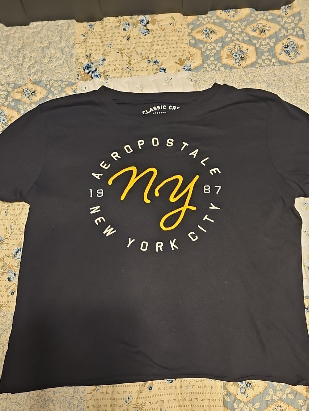 Aeropostale Navy Short-Sleeve Tee with Yellow NY Script and White Circle Text